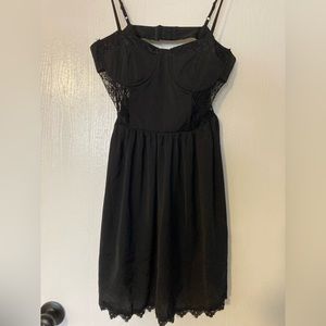 Little black spaghetti strap mini dress with lace panels on the sides size M